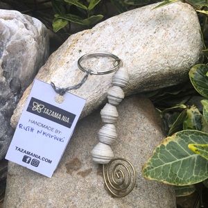 Tazama Nia Keychain Made from recycled calendars.